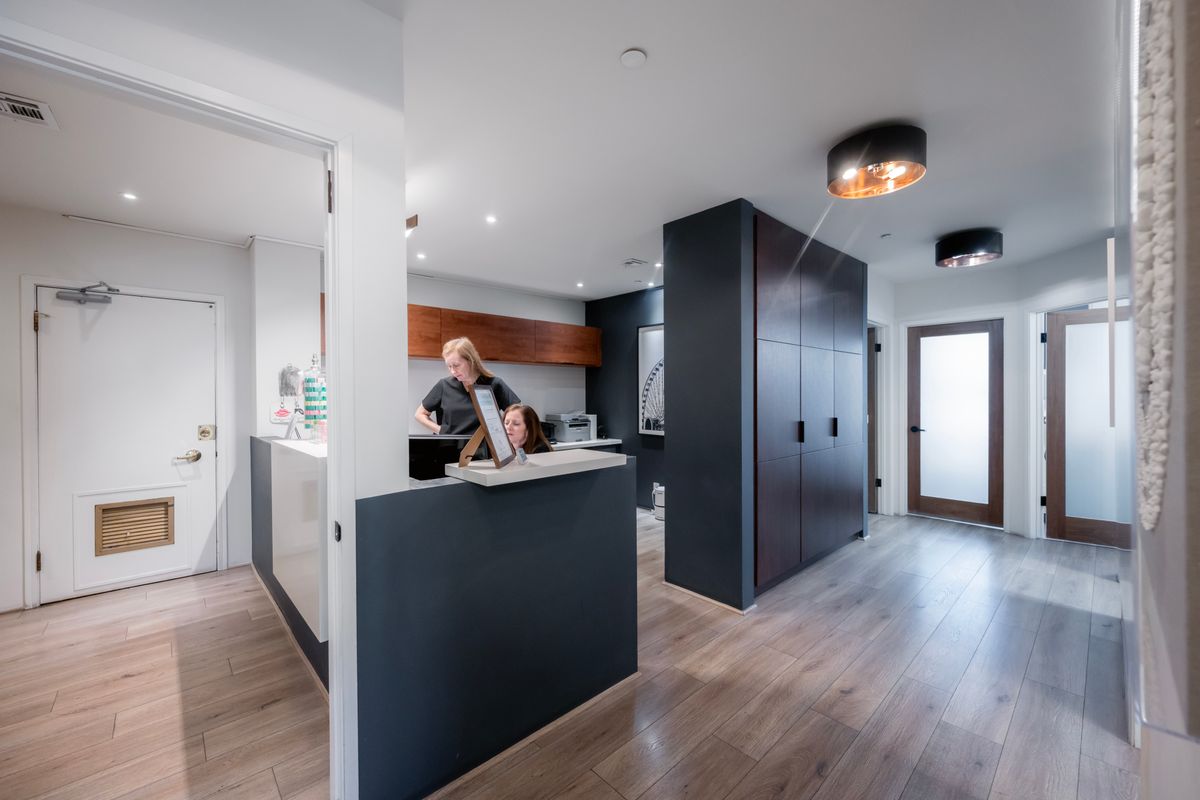 The reception area of a modern, professional dental clinic